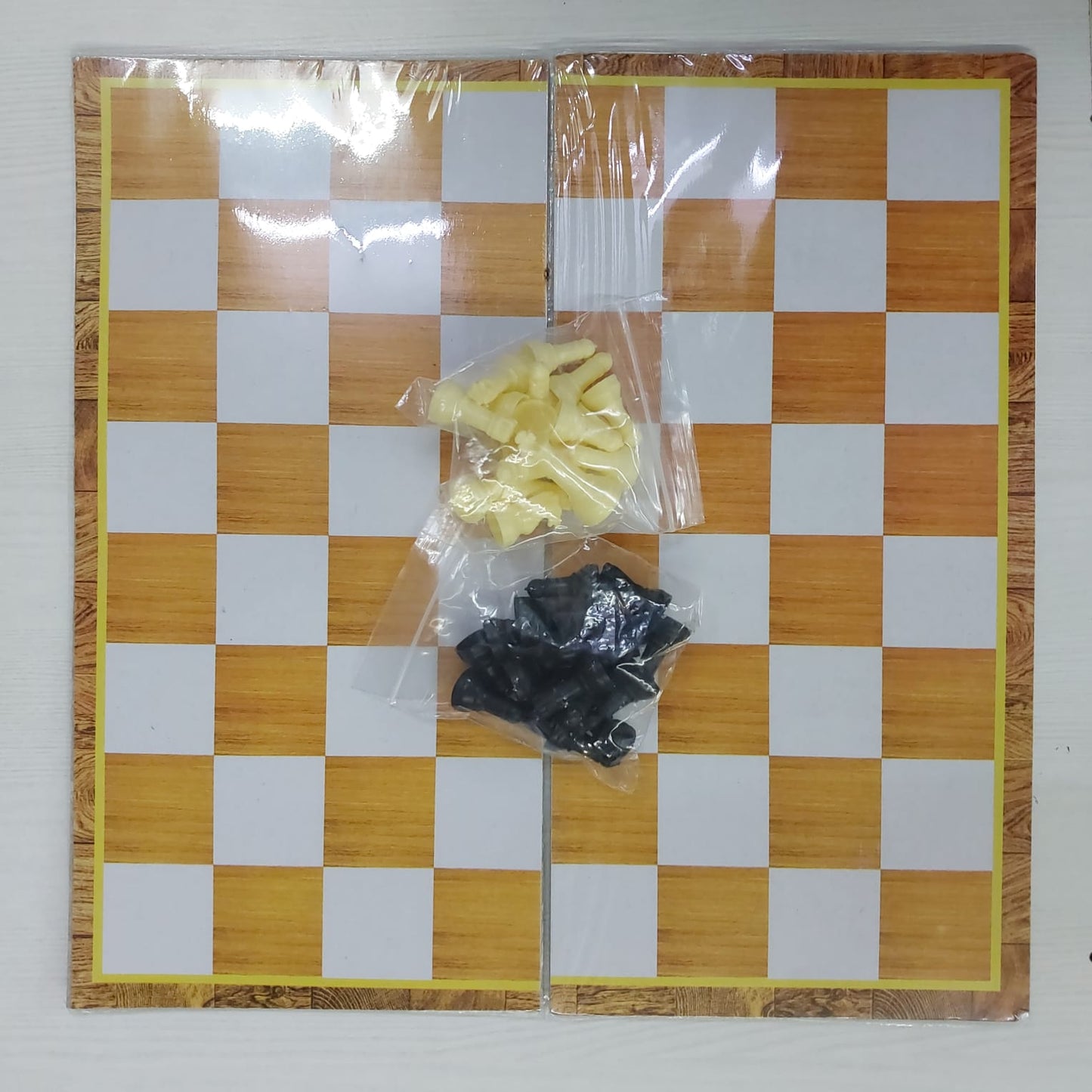 2 in 1 Game, Ludo and Chess Foldable Plastic Mat - Ideal for Parties, Fun, and Family Game Nights (Size 12 Inch, Colour And Design May Vary)