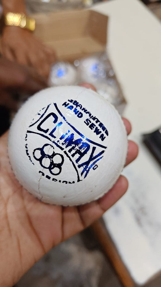 white 4 cut leather ball